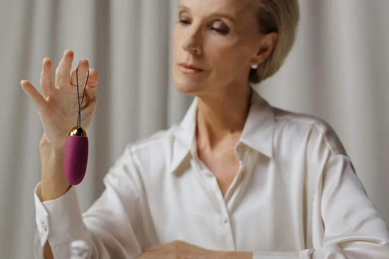 woman holding a vibrator