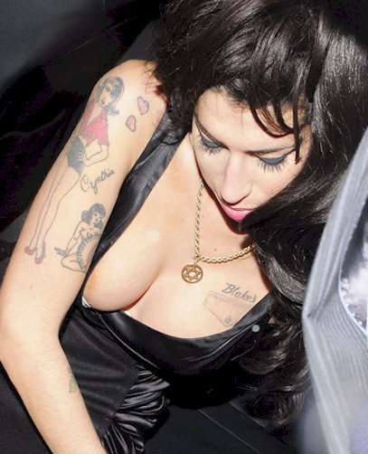 Amy Winehouse's Boob Falling Out - The Nip Slip