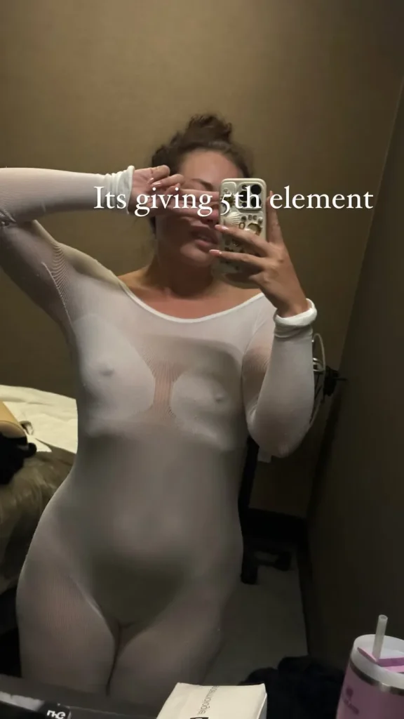 Dora Madison Burge showing nipples in a body suit selfie