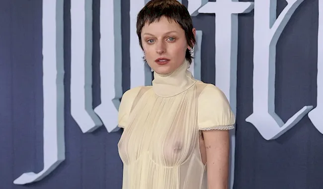 Emma Corrin nipples in a sheer dress