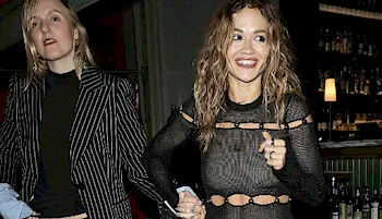 Popstar Rita Ora holding he friends hand while leaving a restaurant in London
